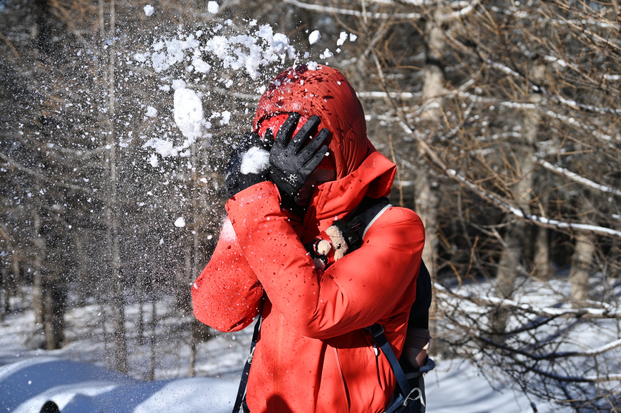 Playing in the snow while hiking
